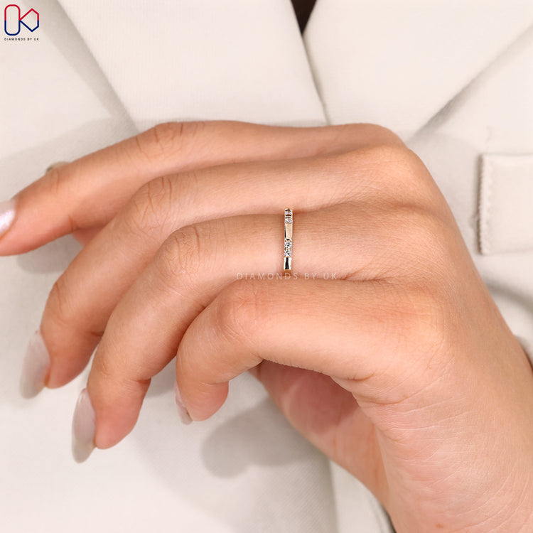 Handmade yellow gold diamond band for a modern look.
