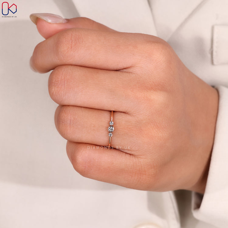 Handmade jewellery 3 stone diamond band in rose gold.
