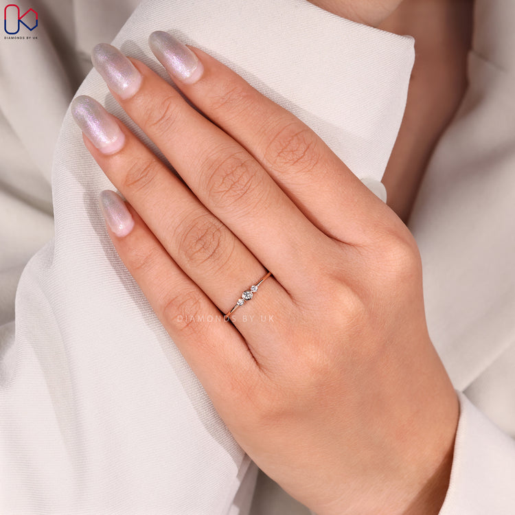 Handmade bezel set diamond band by Diamondsbyuk.
