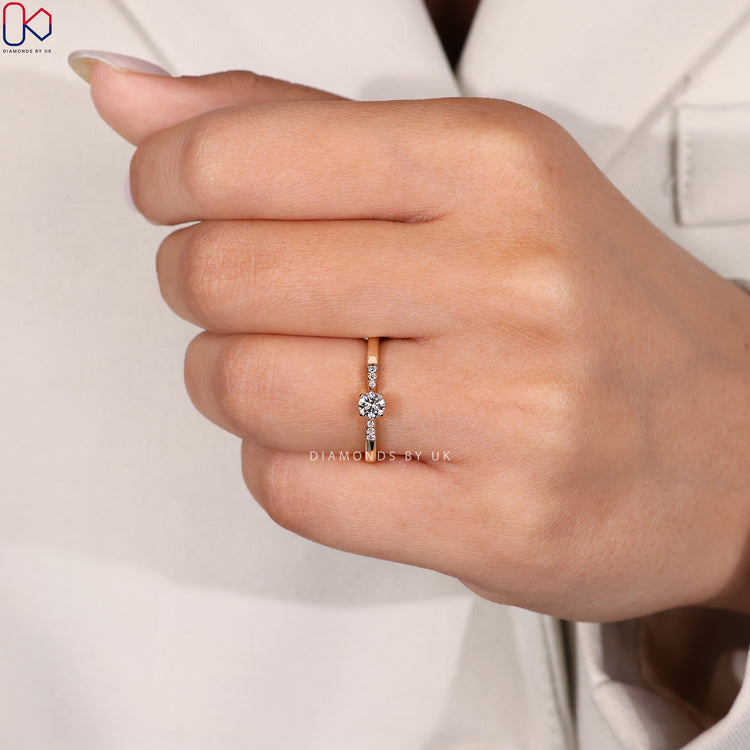 Yellow diamond gold ring with prong setting
