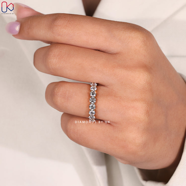 Round cut half eternity band handmade.
