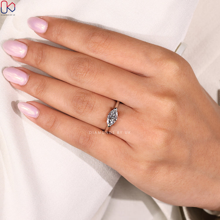 Buy marquise solitaire diamond ring in east west style.
