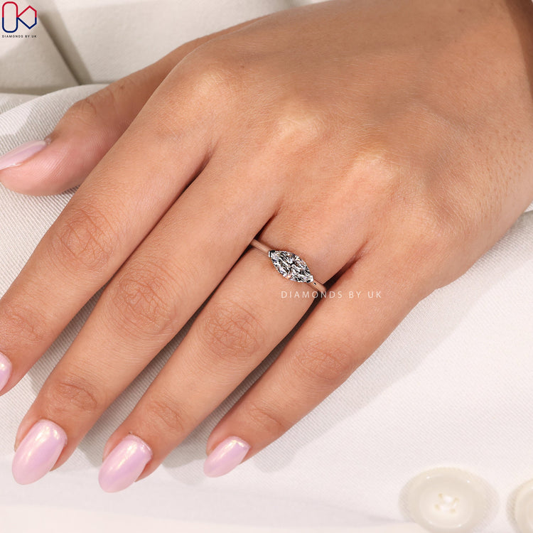 Handmade jewelry featuring marquise cut diamond in white gold.
