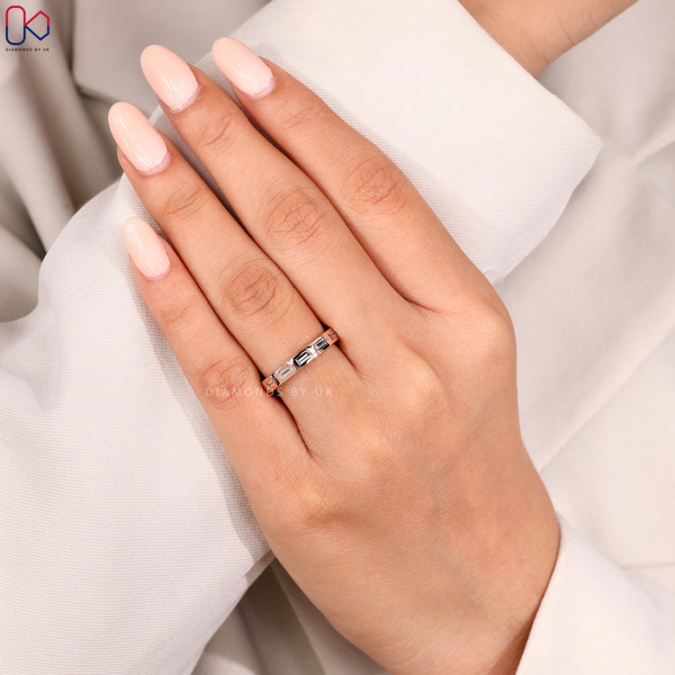 Custom diamond band with baguette cuts.
