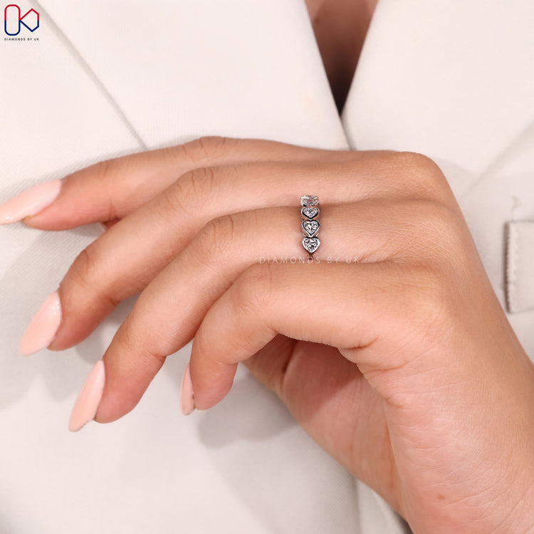 Buy wedding band with heart diamonds.
