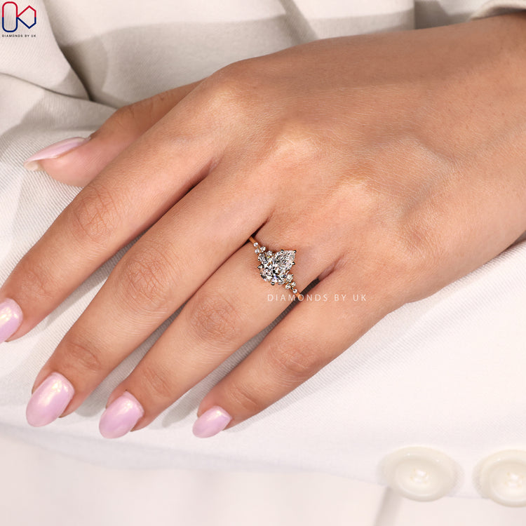 Elegant snowdrift pear diamond ring by Diamondsbyuk.
