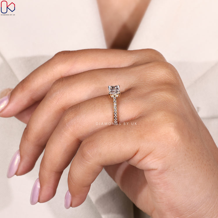 Cathedral setting diamond engagement ring with radiant cut.

