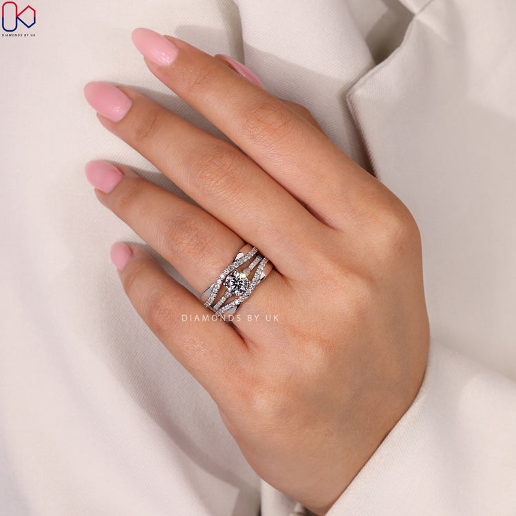 Pave setting ring featuring small diamonds along the band.
