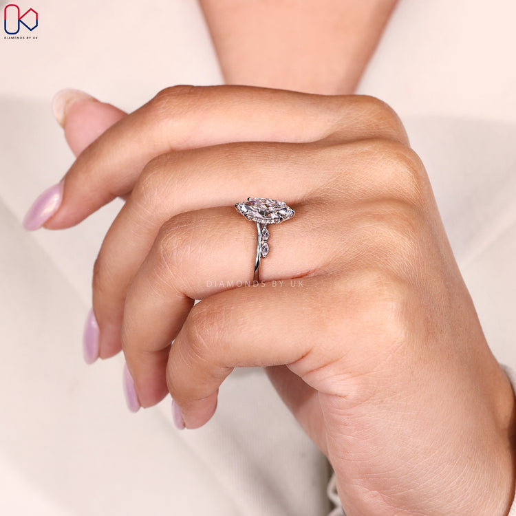Round cut hidden halo style engagement ring.
