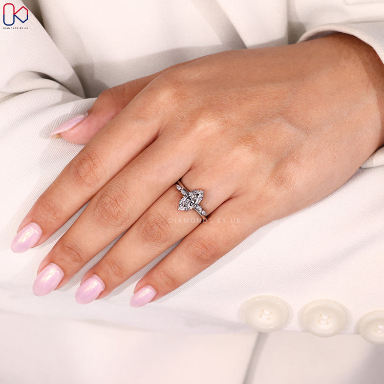 Six claw prong setting marquise diamond engagement ring.
