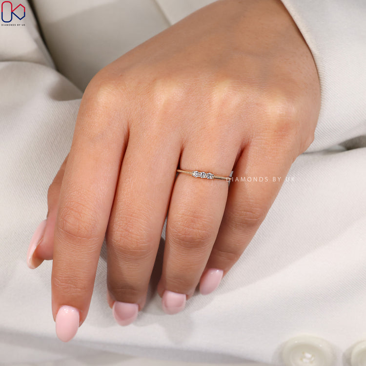 Prong setting band with 3 stone wedding band.
