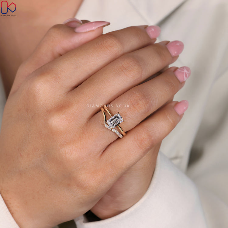 Half eternity wedding band with diamonds along half of the band.
