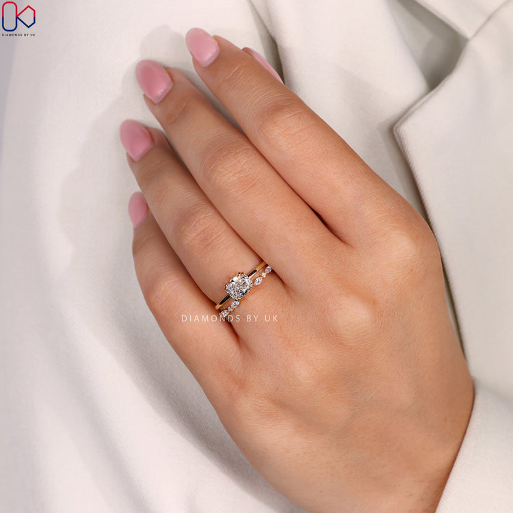 Yellow gold bridal set with coordinated engagement and wedding rings.
