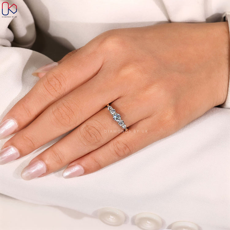 Diamondsbyuk wedding band in yellow gold.
