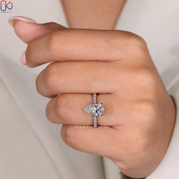 Pave setting ring with brilliant round diamonds.
