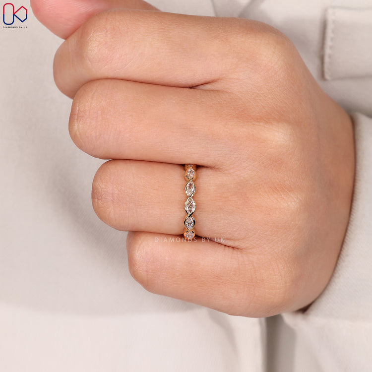 Full eternity wedding band with marquise stones.
