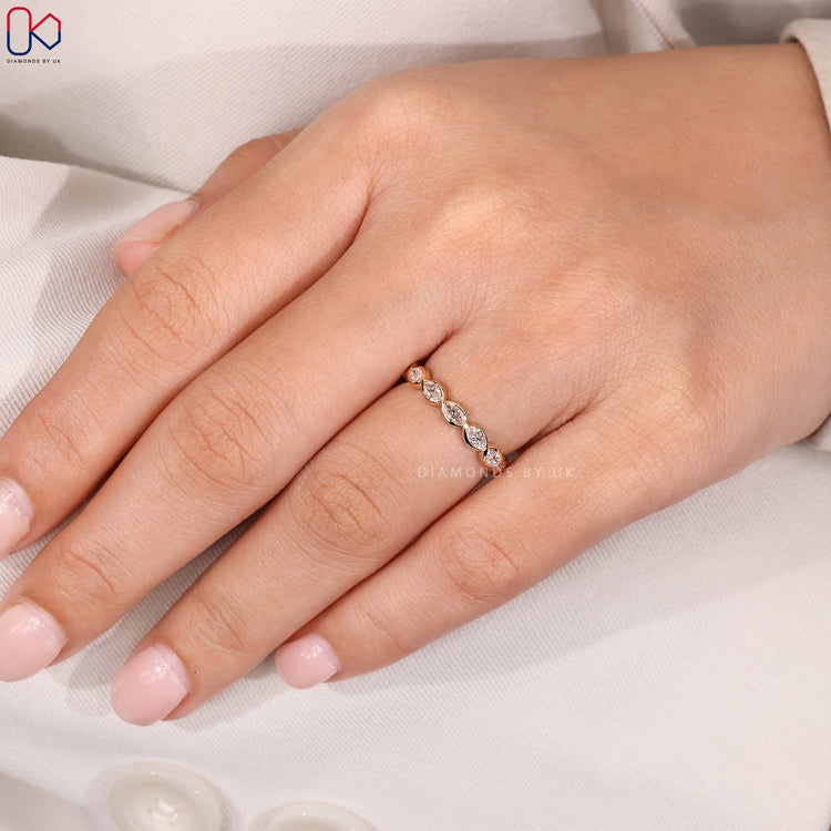 Diamondsbyuk wedding band in yellow gold.
