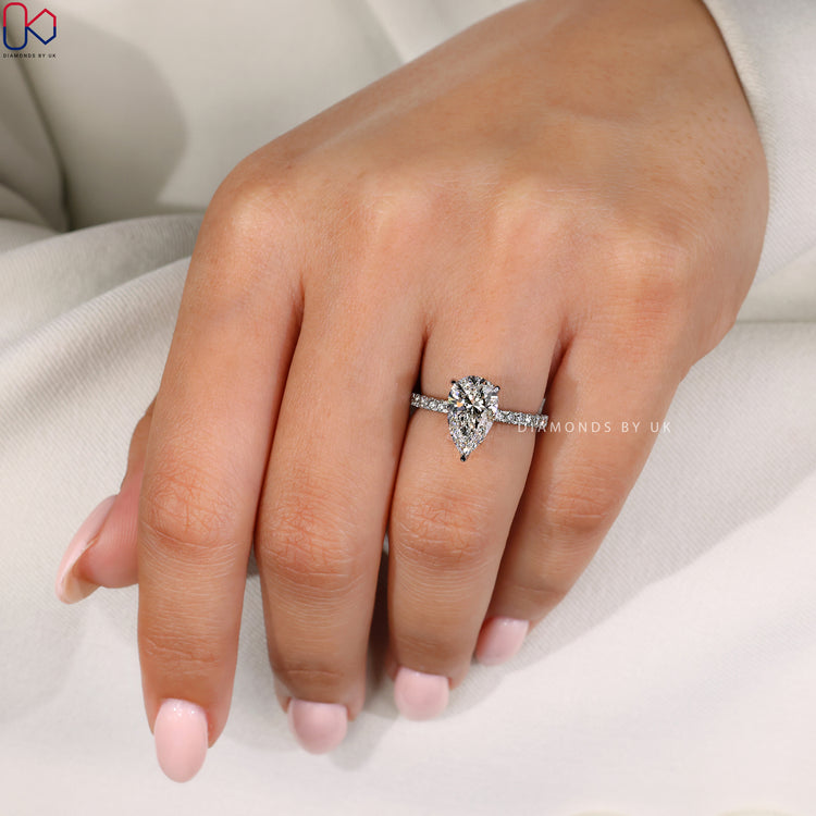 Handmade ring featuring a pear cut diamond design.
