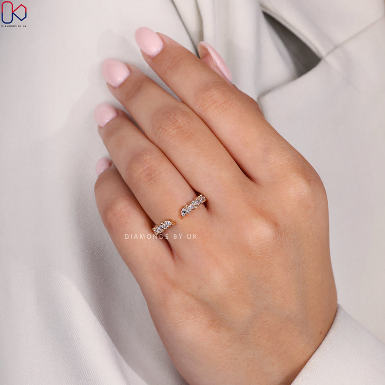 Handmade jewellery featuring open band and round setting.
