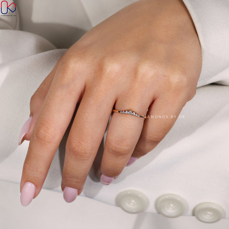 Diamondsbyuk wedding band crafted with seven sparkling stones.
