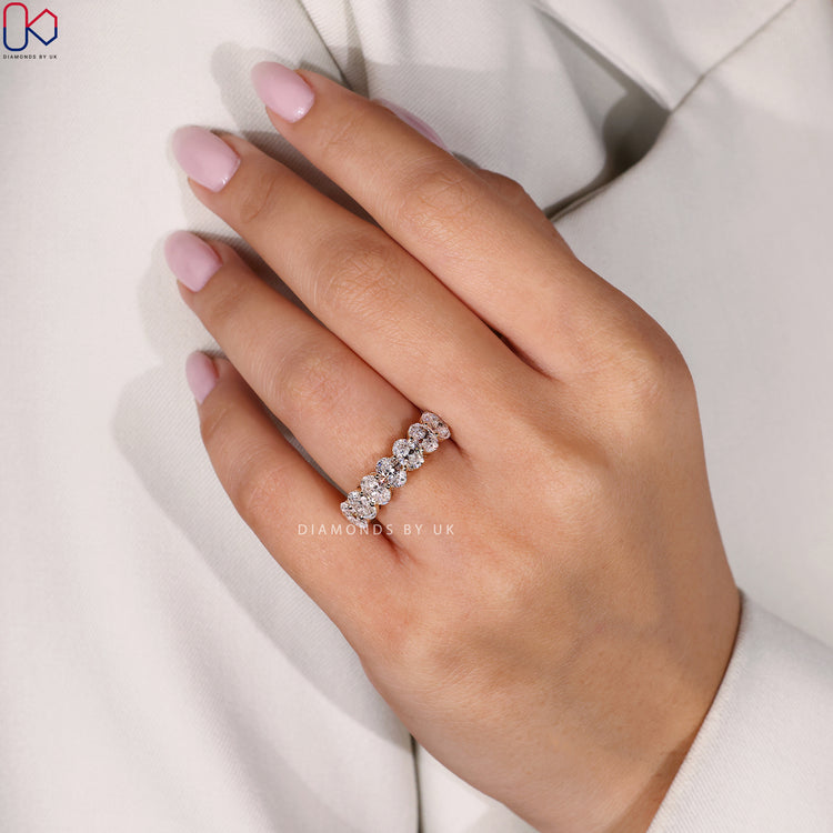 Handmade jewellery with yellow gold and oval cut lab grown diamonds.
