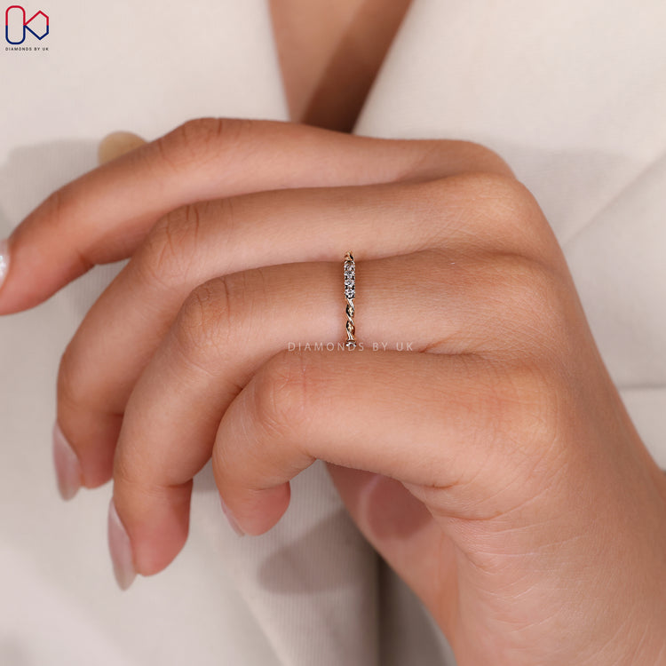 Custom diamond band with twisted rope design.
