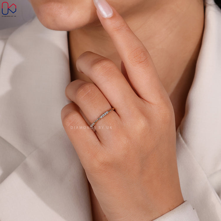 Diamondsbyuk wedding band in yellow gold.
