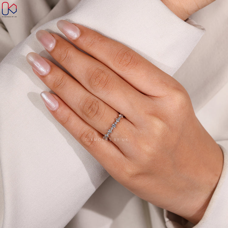 Diamondsbyuk wedding band in yellow gold.
