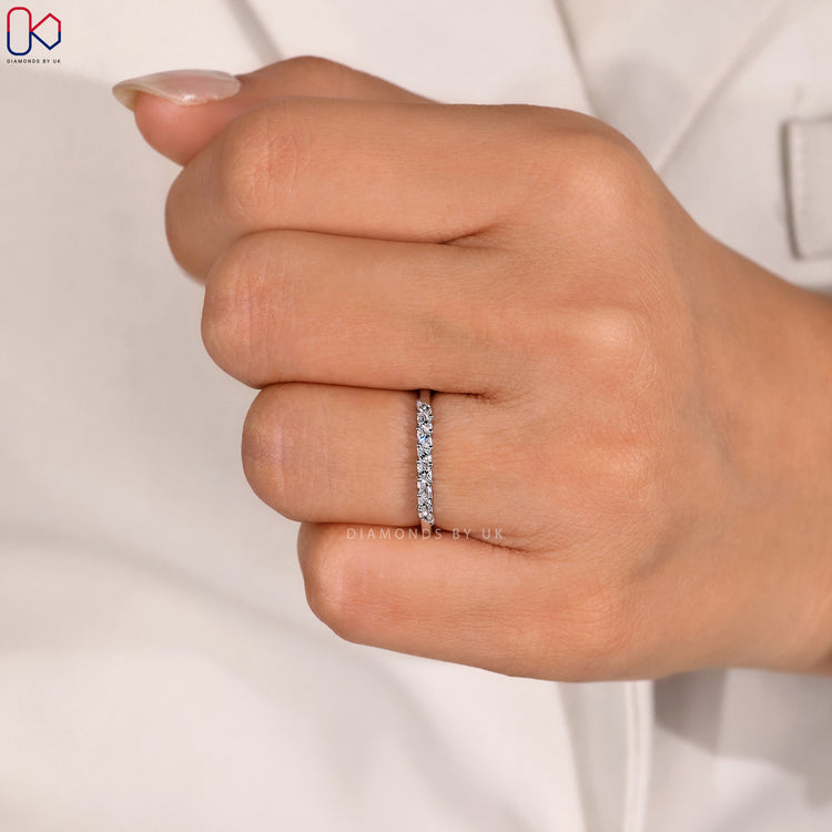 Half eternity diamond band with marquise stones.
