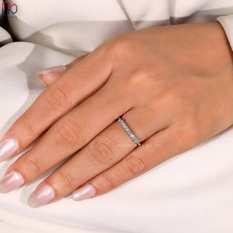 Handmade band with marquise diamonds.
