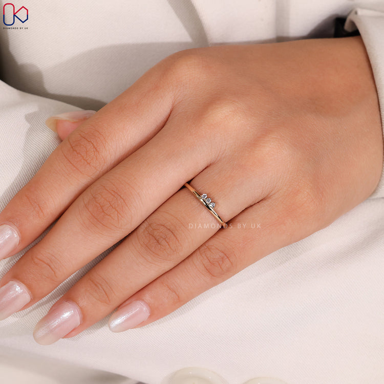 Diamondsbyuk wedding band in yellow gold.
