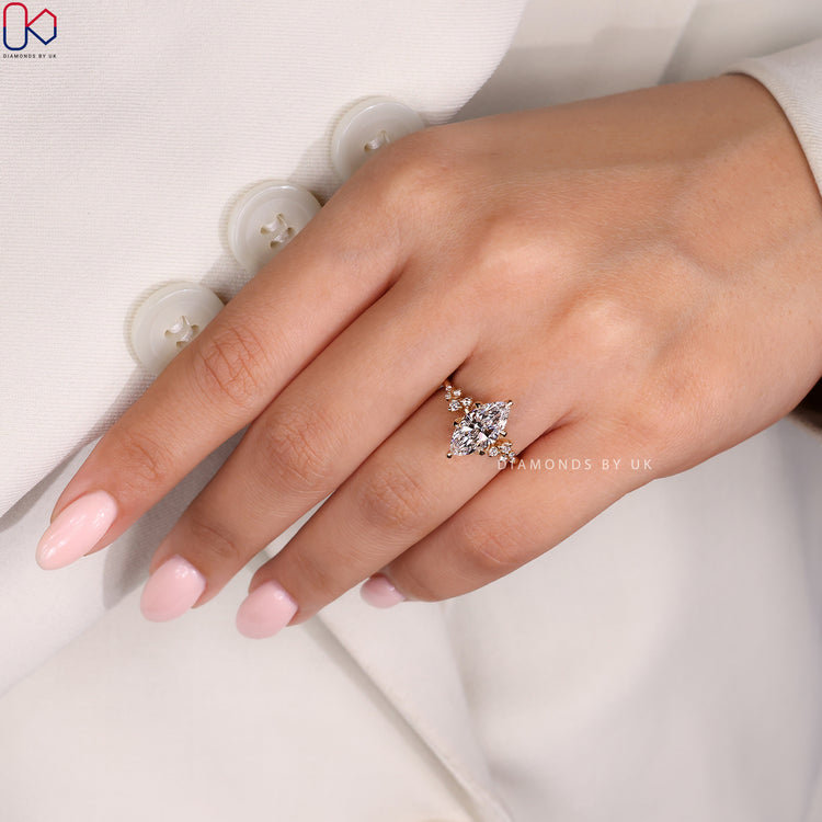 Lab grown marquise cut diamond engagement ring.
