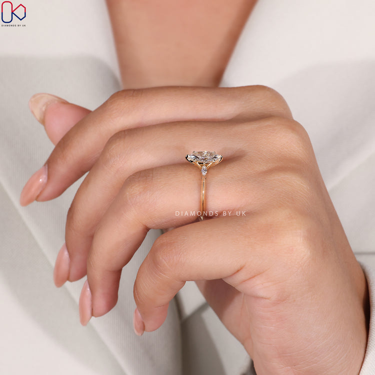 Knife edge shank marquise diamond engagement ring.
