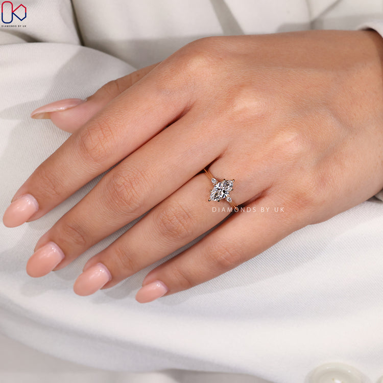 Six claw prong setting marquise diamond engagement ring.
