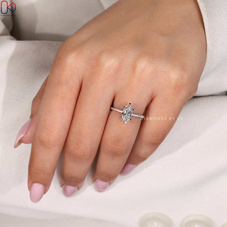 Handmade ring with a marquise cut diamond.
