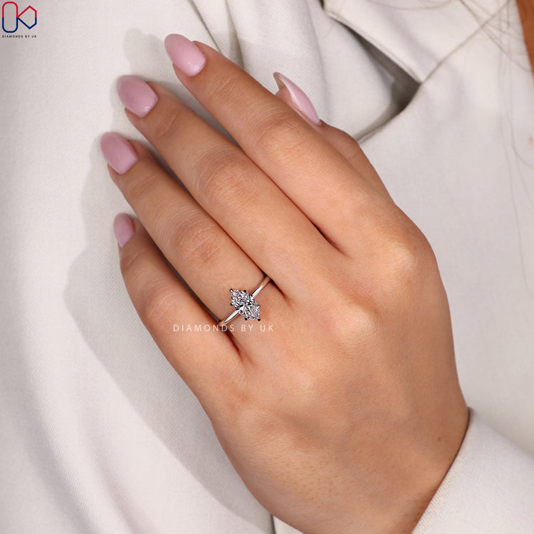 Customize ring with lab-grown marquise diamond.
