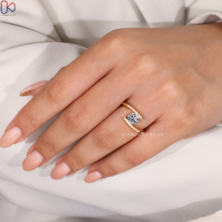 Round diamond solitaire ring featuring a lab grown centre stone in a bold design.
