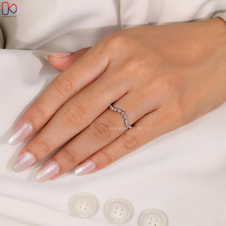 Diamondsbyuk wedding band in yellow gold.
