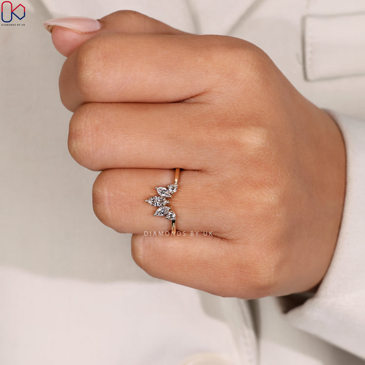 Handmade jewellery with crown wedding band.
