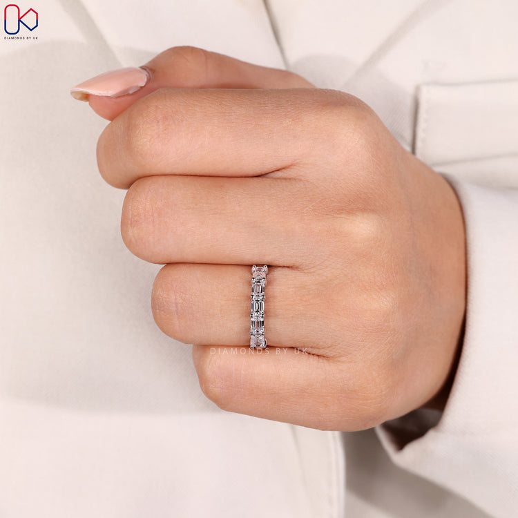 Diamondsbyuk wedding band in yellow gold.
