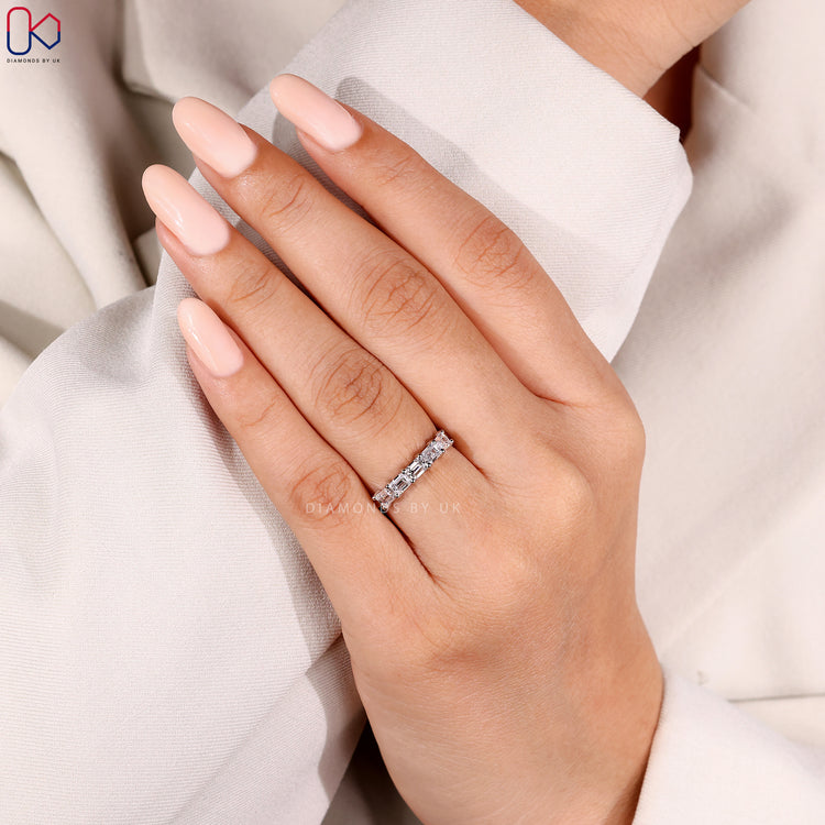 Custom diamond band with round diamonds.
