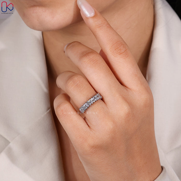 Shared prong white gold wedding band with round and marquise diamonds.
