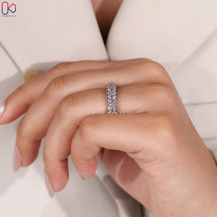 Custom white gold half eternity wedding band with diamonds.
