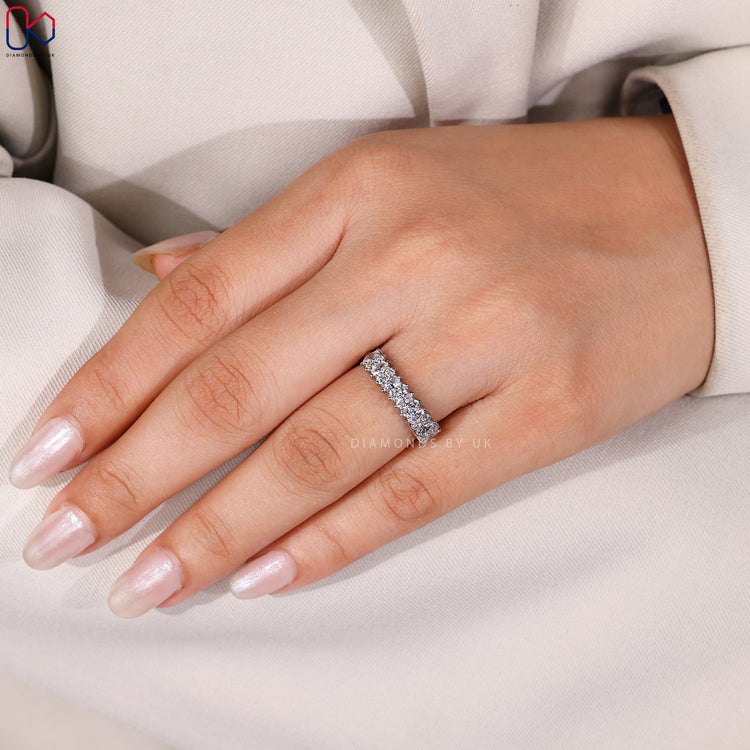 Buy white gold half eternity diamond band with round and marquise stones.
