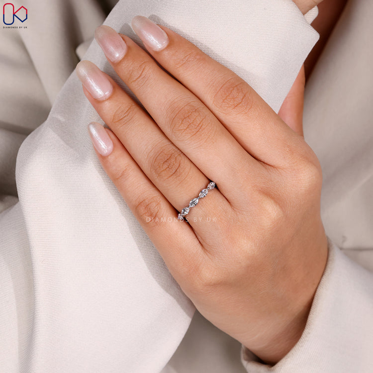 Custom diamond band with marquise stones.
