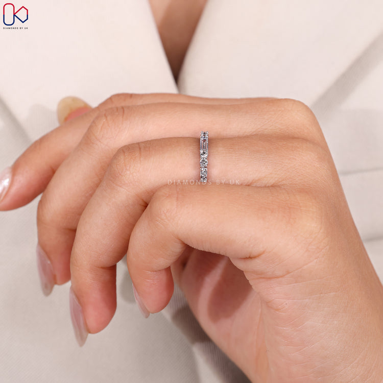 Handmade band with baguette and round diamonds.
