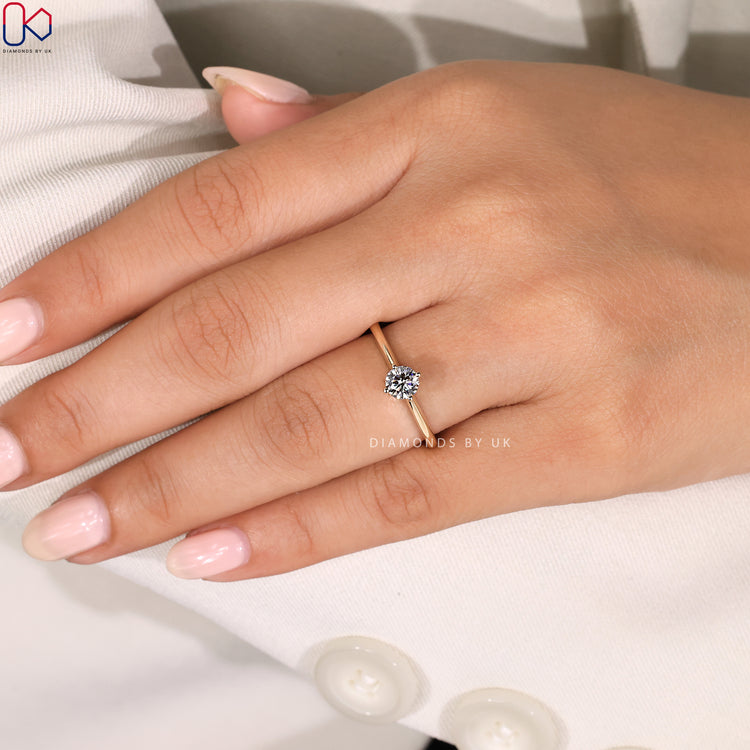 Lab grown round cut diamond engagement ring.
