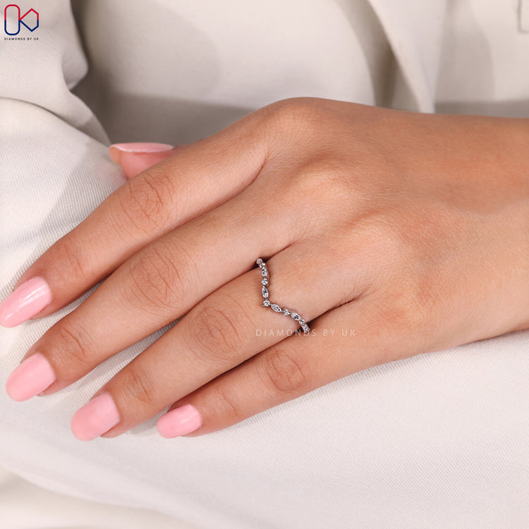 Handmade jewellery curved diamond band.
