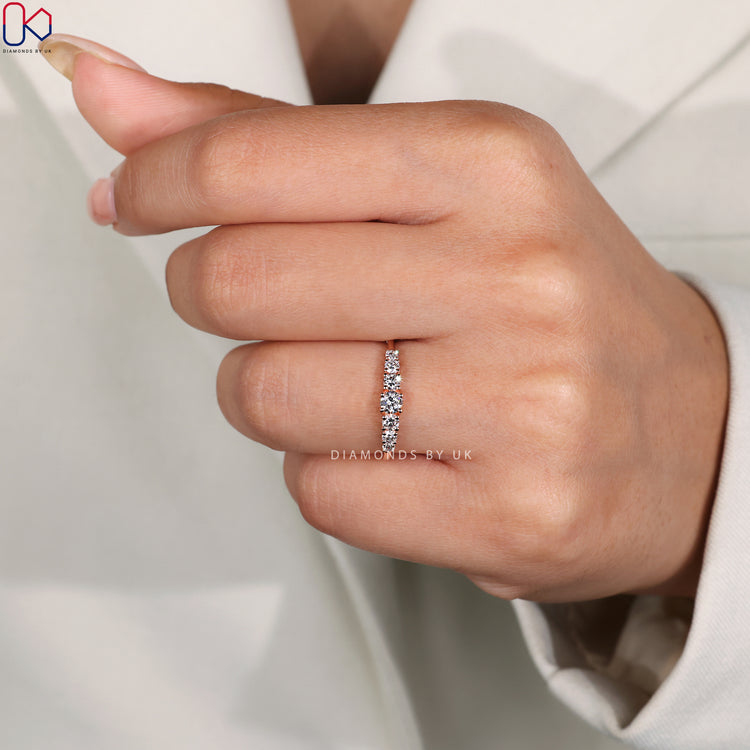 Handmade jewellery with 7 stone round diamond band.
