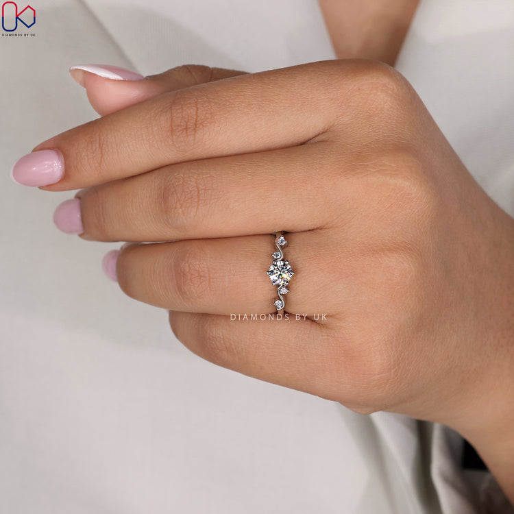 6 prong setting securely holds the round lab grown diamond in white gold.
